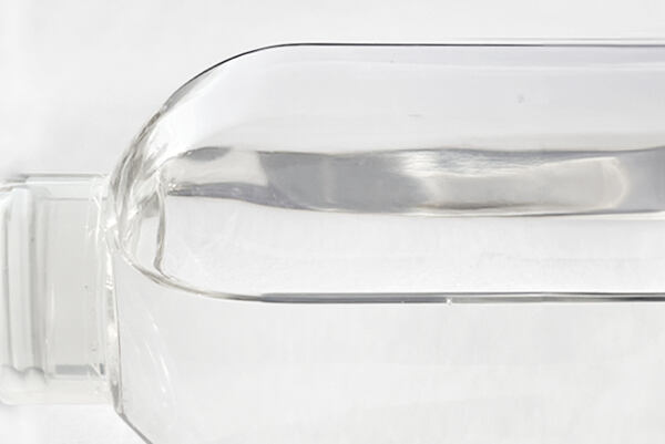 Priehľadná tekutina v laboratórnej nádobe – kyselina mliečna.